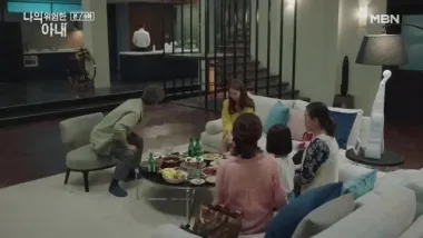 E6.Wife behind Husband